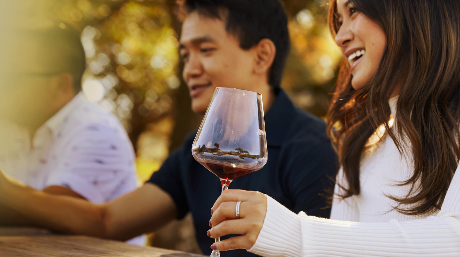 Man and woman enjoying a wine tasting session.